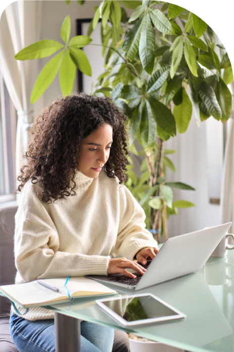 Young woman using laptop for e-learning
